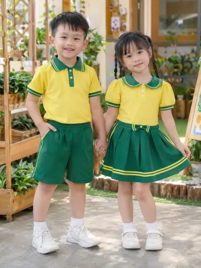 Đồng Phục Mầm Non Váy Bé Gái Vàng Chanh Xanh Lá Piquecool